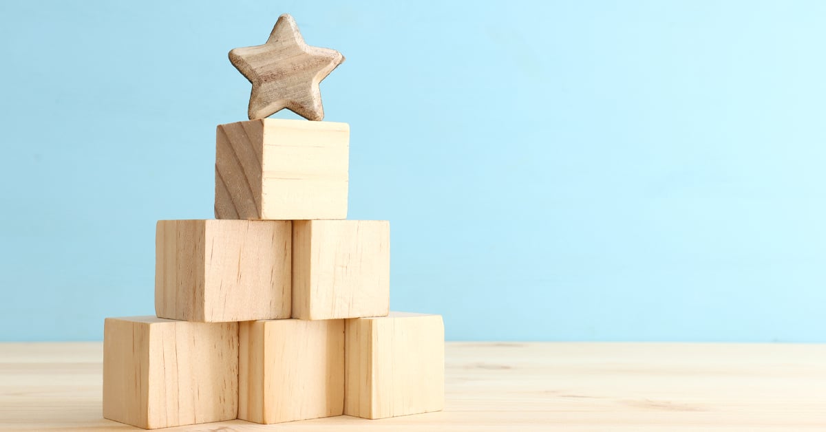 Block with star on top