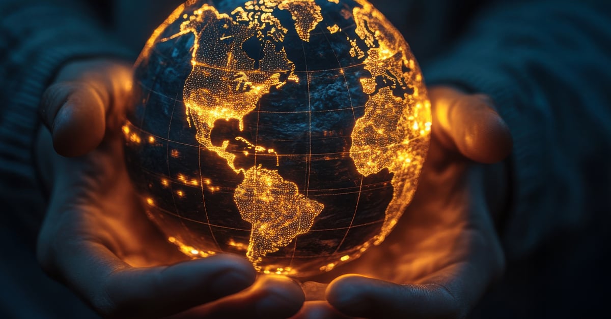 Hands holding globe